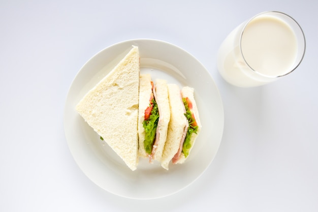 Sandwich and milk glass.