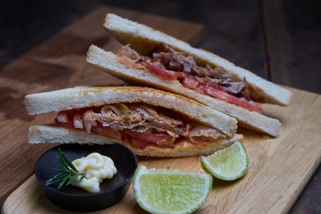 Sandwich serving on wooden board