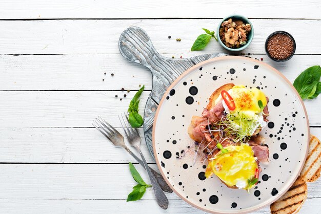 Sandwich with bacon egg and chili pepper Breakfast In the plate Top view Flat lay composition Free copy space