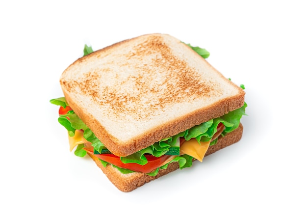 Sandwich with cheese, turkey and fresh vegetables on a white background. Side view, close-up.