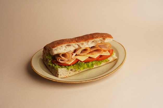 Sandwich with ham lettuce and tomato