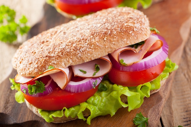 Sandwich with ham tomato and lettuce