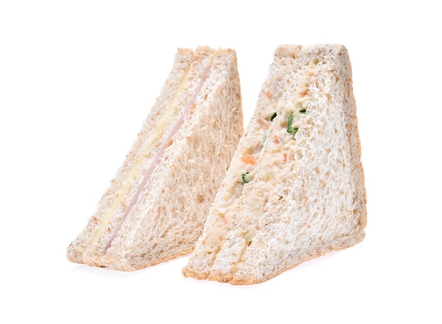Sandwich with ham tuna and vegetables on white background