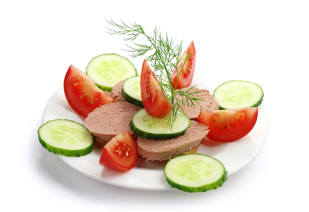 Sandwich with liverwurst, fresh cucumber and tomato on white
