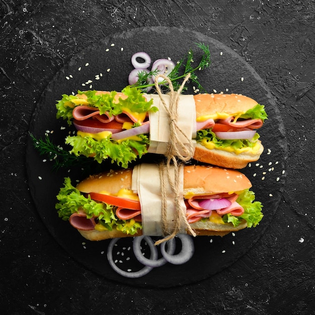 Sandwich with sausage cheese and lettuce Street food Top view Free copy space