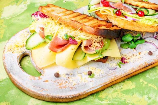 Sandwiches on cutting board