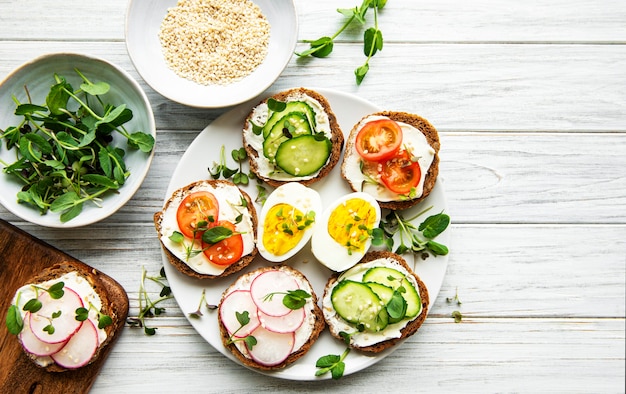 Sandwiches with healthy vegetables and micro greens