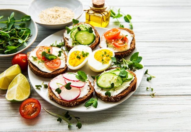 Sandwiches with healthy vegetables and micro greens