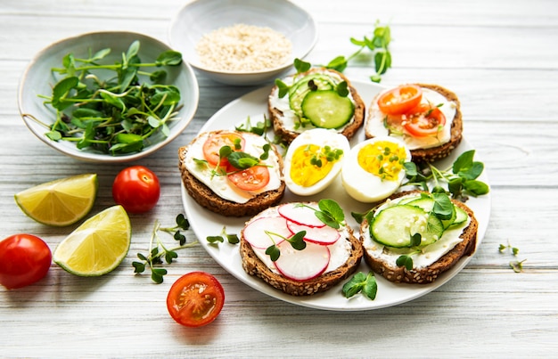 Sandwiches with healthy vegetables and micro greens