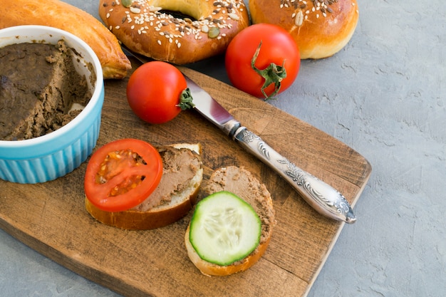 Sandwiches with liver pate and vegetables.