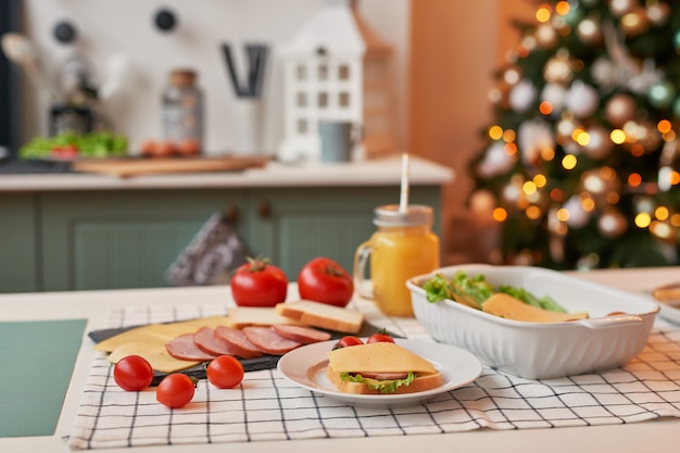 sandwiches with vegetables, cheese and sausage on a's table