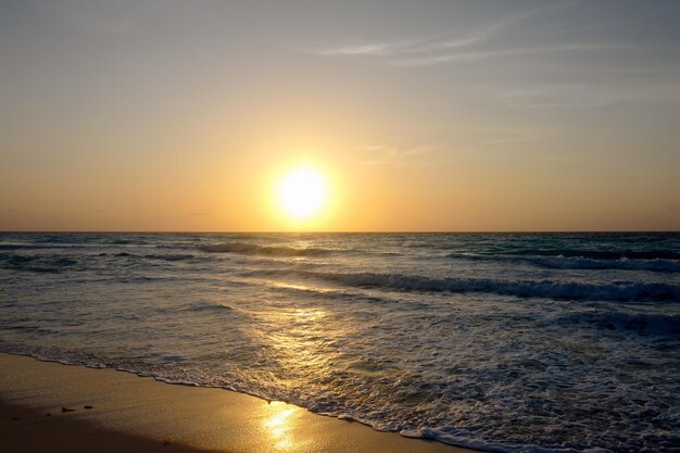 Sandy beach on the sunrise