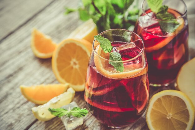 Sangria and ingredients in glasses