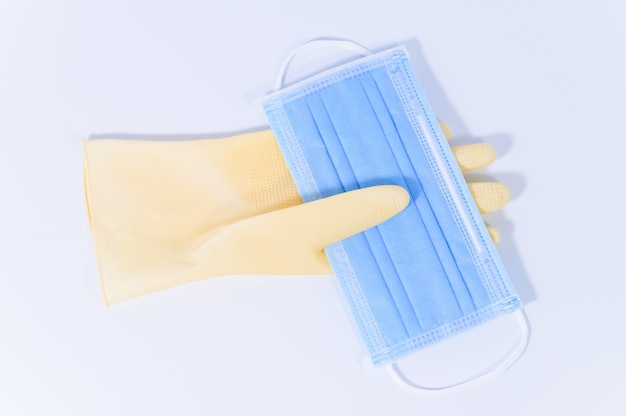 Sanitary gloves, mask white surface