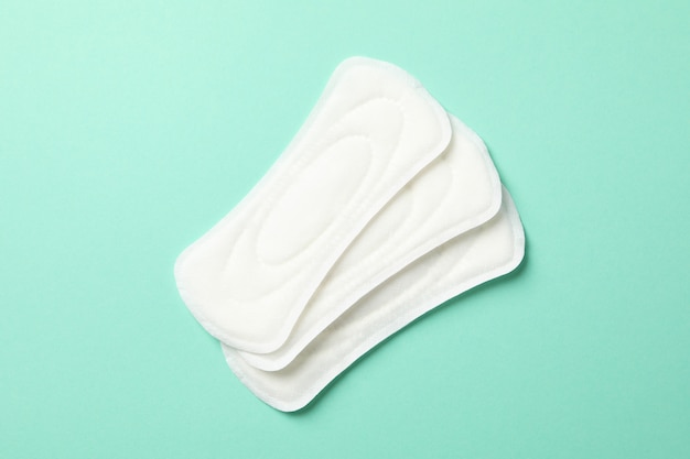 Sanitary pads on mint surface