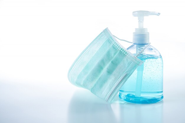 Sanitizer gel fles en medisch gezichtsmasker