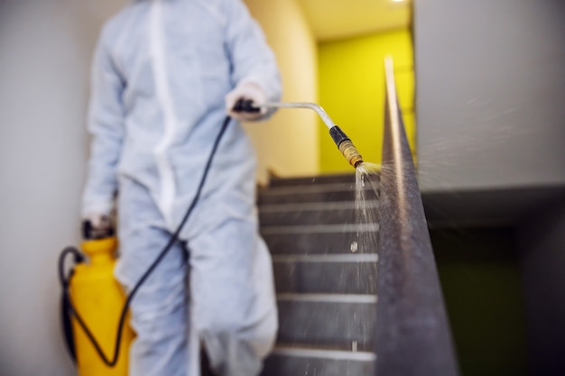 Sanitizing interior surfaces. Cleaning and Disinfection inside buildings, the covid-19 epidemic. sessional teams for disinfection efforts. Infection prevention and control of epidemic.