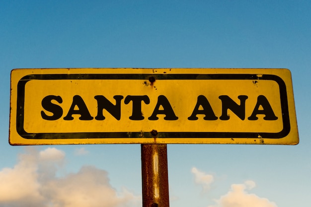 Santa Ana city old yellow sign with blue sky