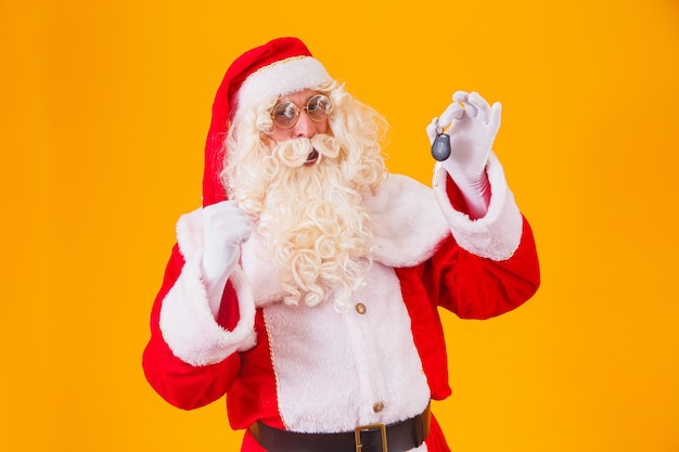 Santa Claus carries car keys in a special year-end promotion