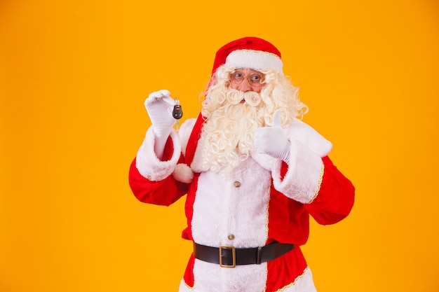 Santa Claus carries car keys in a special year-end promotion