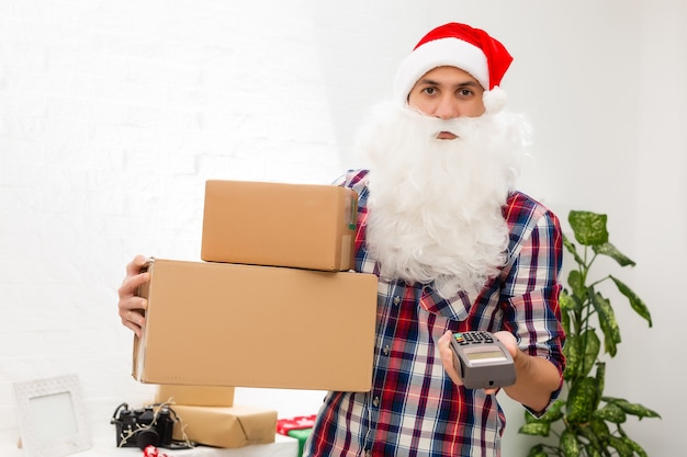 santa claus carrying a cardboard box on white background