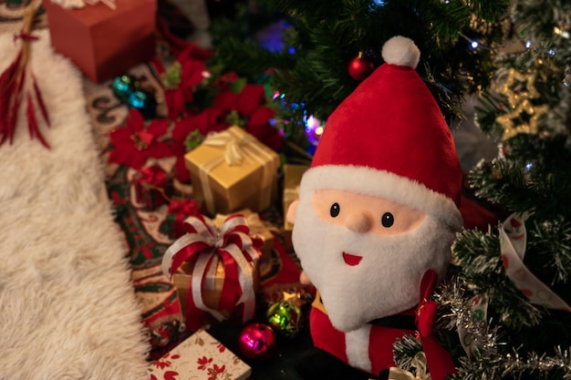 Santa Claus and Christmas tree with presents