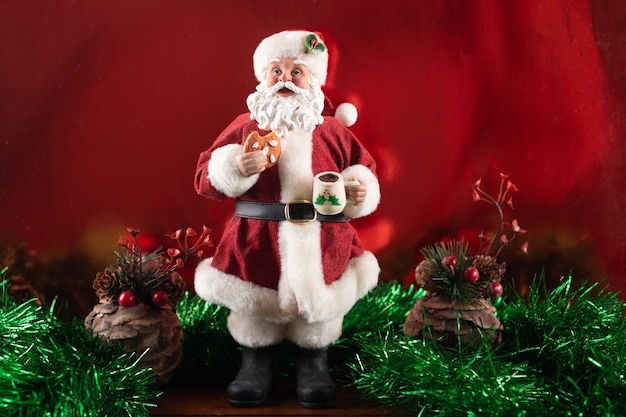 Santa Claus decoration on the table on a Christmas  background