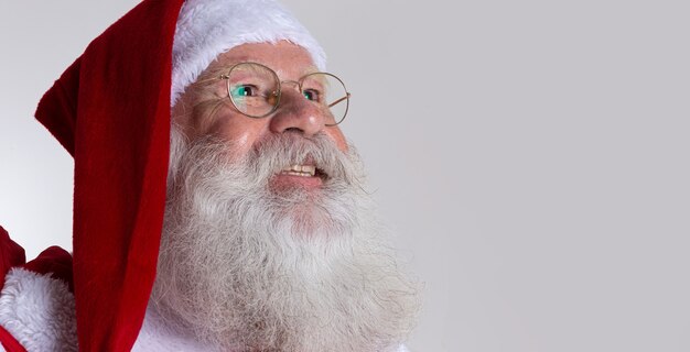 Santa Claus on gray background with copy space. Banner art.