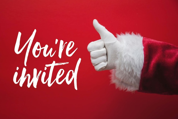 Santa Claus hand thumbs up with a festive message