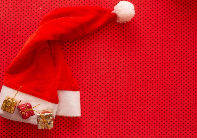 santa claus hat with mini gift boxes on top