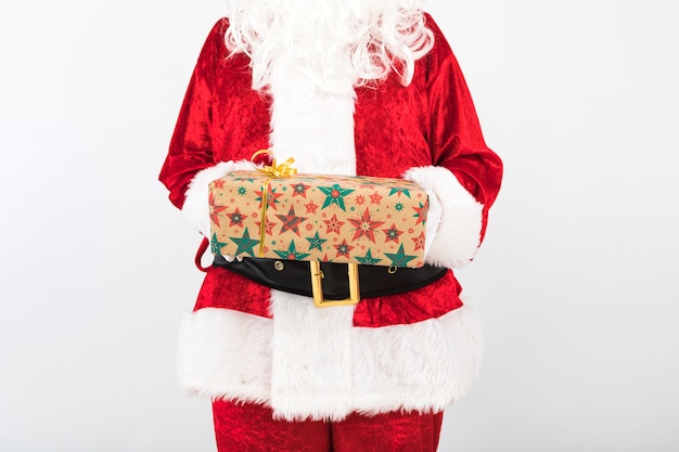 Santa Claus hold a gift on white background