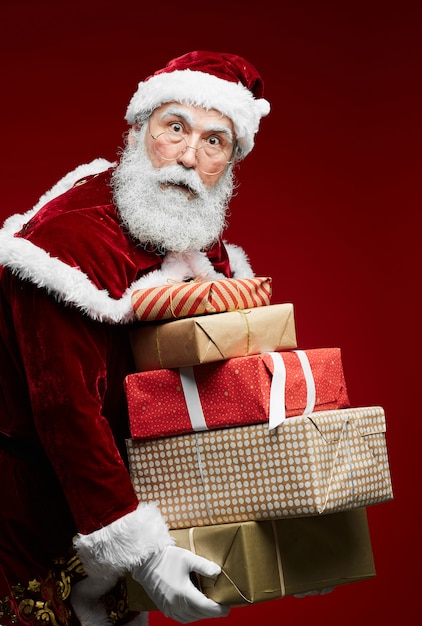 Santa Claus Holding Christmas Presents