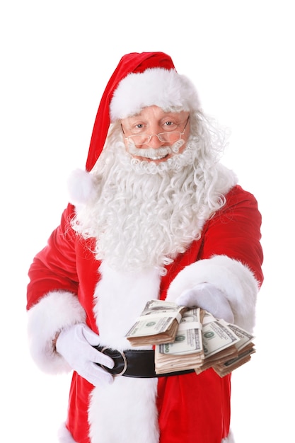 Santa Claus holding money on white surface