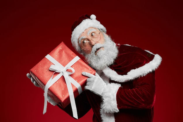 Santa Claus Holding Present