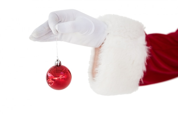 Santa claus holding red bauble