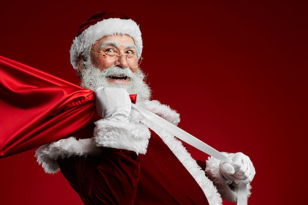 Santa Claus Holding Sack met presenteert