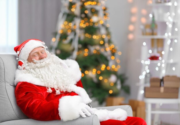 Santa Claus listening to music in living room