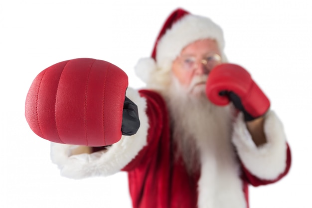 Photo santa claus punches with his right