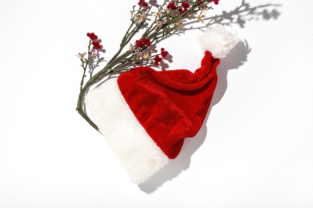 Santa Claus red hat isolated from above on colorful background