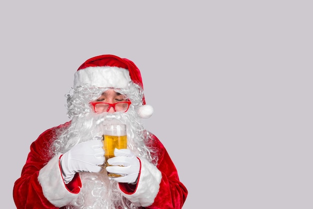 Santa claus show glass of beerafter party las nightHappy christmas dayHappy time with family