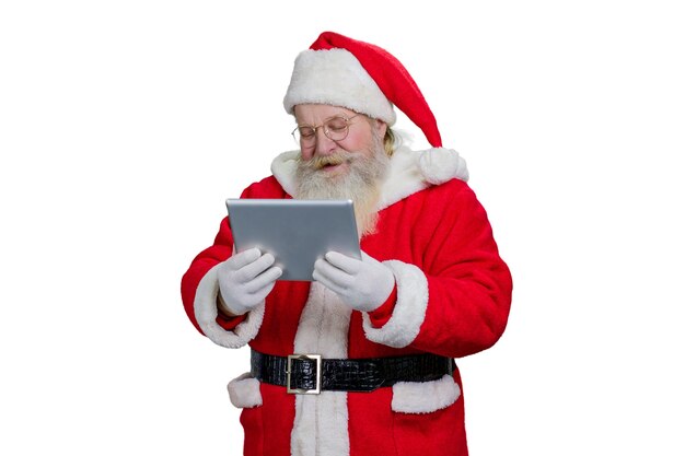 Santa Claus using pc tablet.