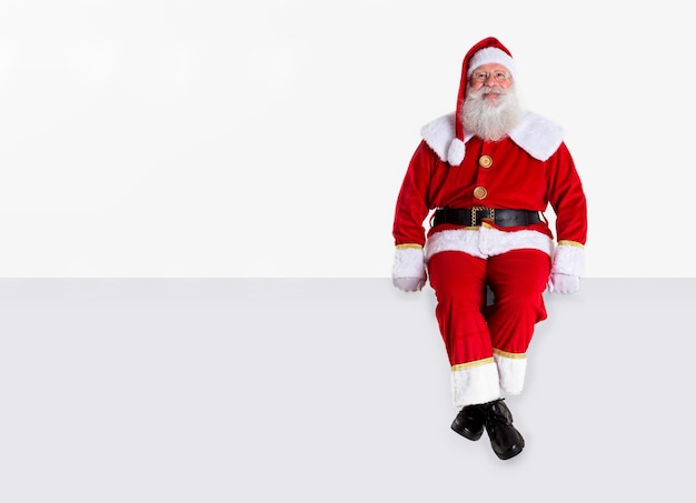 Photo santa claus on white background with copy space. banner art.
