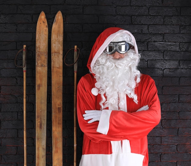 Santa Claus with wooden skis