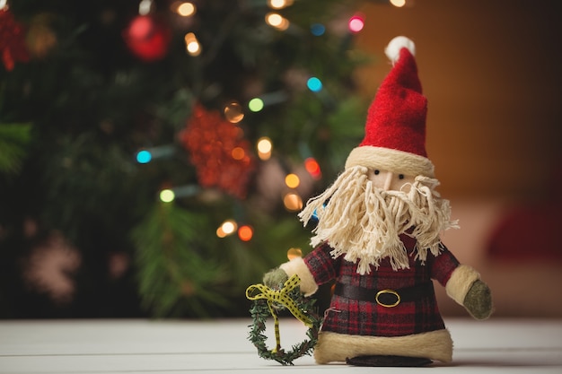  santa claus on wooden table