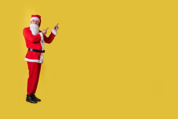 Santa claus yellow food big eat holiday christmas costume people trendy celebrate ruks at the top shows