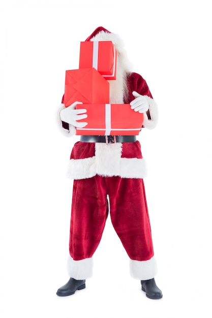 Santa covers his face with presents