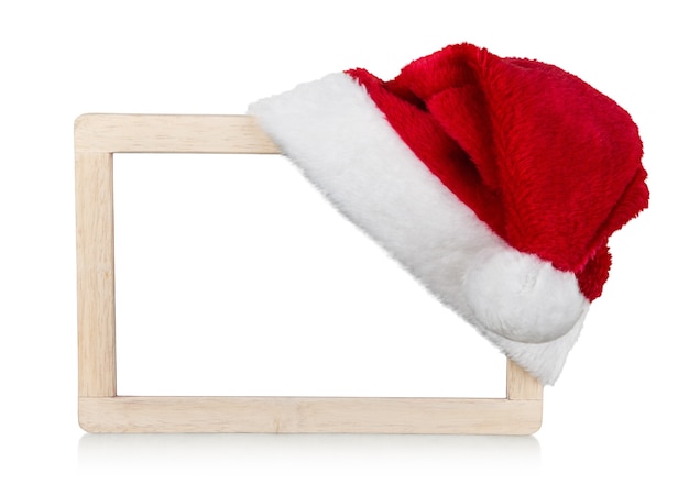 사진 산타 모자와 배경에 고립 된 빈 프레임