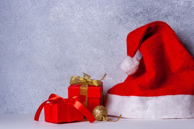 Santa hat gifts with red ribbon