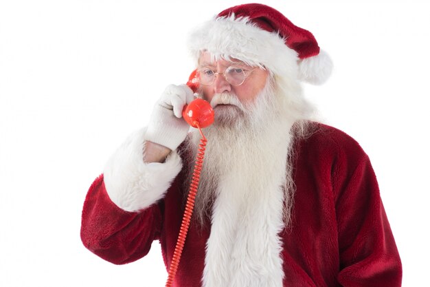 Санта на своем красном телефоне