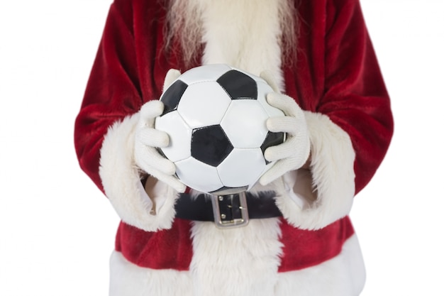 Santa holds a classic football 